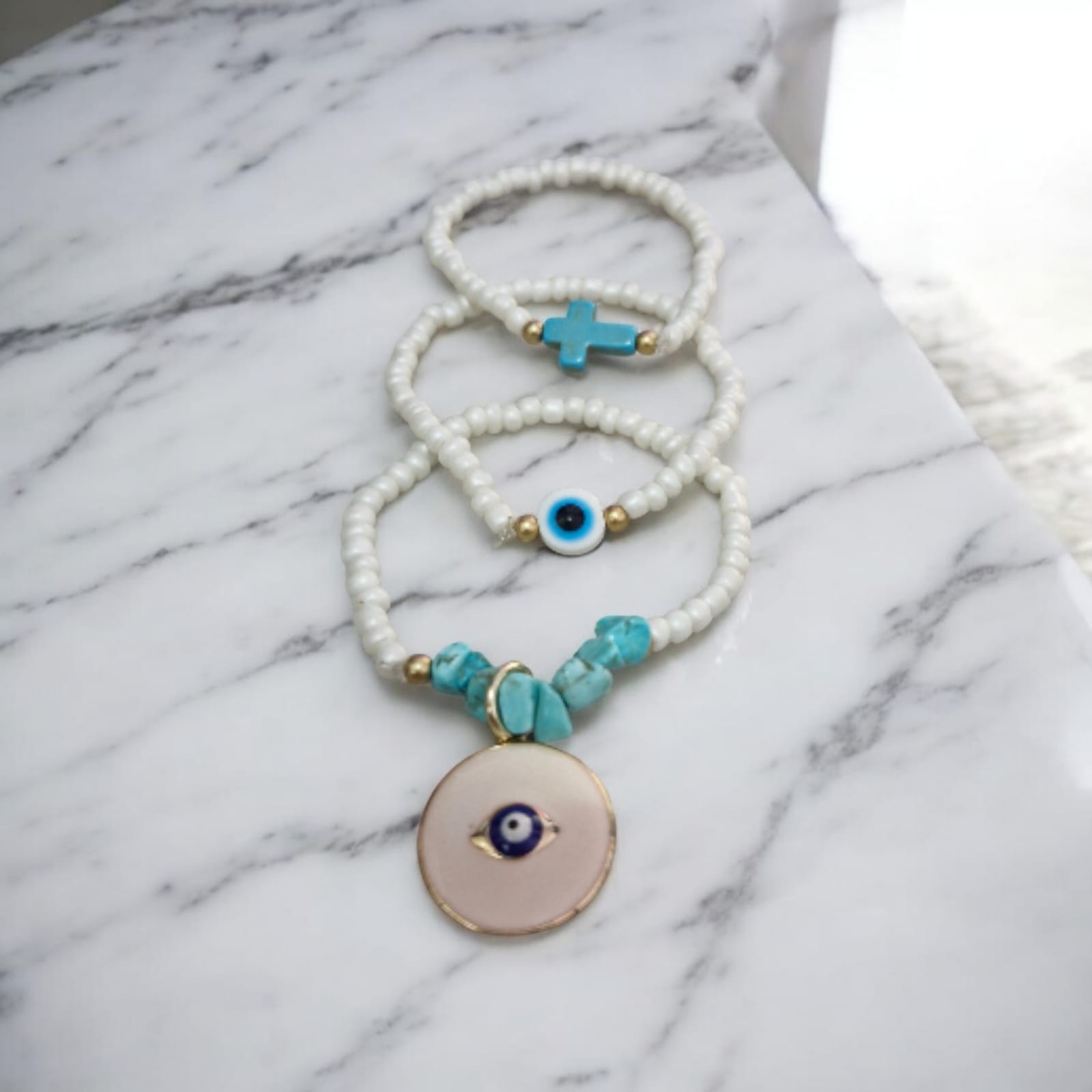 Conjunto Olho Grego Turquesa Violeta Rio — colar + 3 pulseiras (conjunto), cor branco, turquesa, dourado, contas de vidro/plástico, pedras turquesa brutas, metal dourado, resina/cerâmica