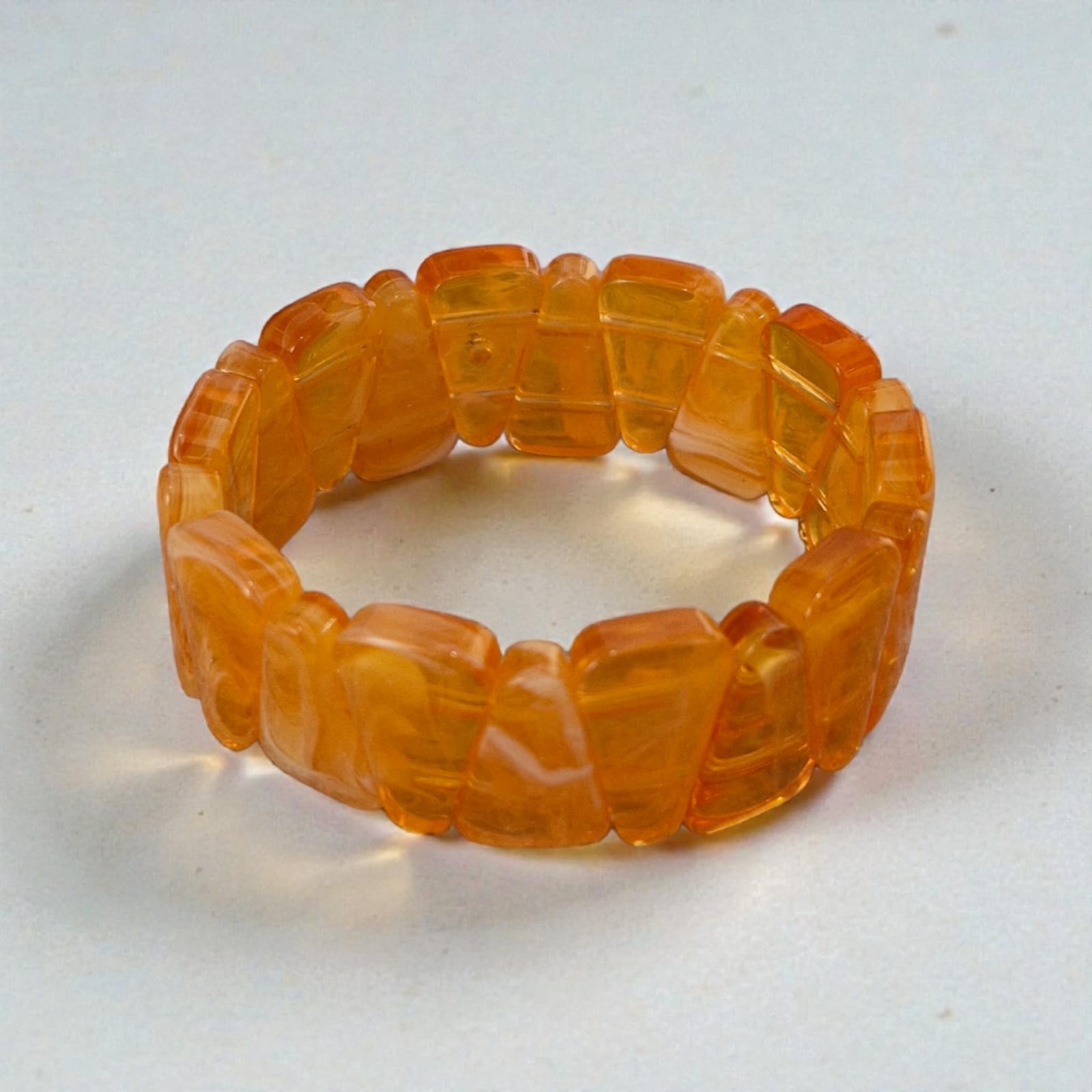 Pulseira Resina Laranja Violeta Rio — pulseira (elástica), cor laranja translúcido, resina translúcida